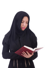 Young muslim female student with books
