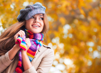 Young woman in autumn park