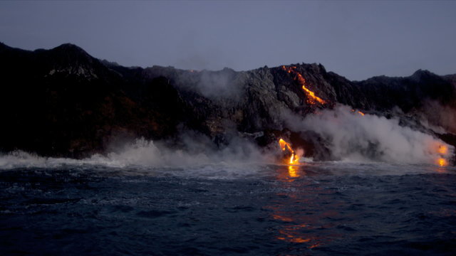 Red Hot Lava Falling Pacific Ocean Waves