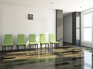 Green chairs in a lobby