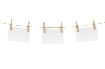 paper cards hanging on the rope