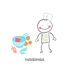 nutritionist standing next to a bowl of vegetables