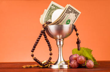 Fototapeta na wymiar Dolar chrześcijaństwo i pieniądze