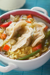 Chinese dumpling and noodle soup