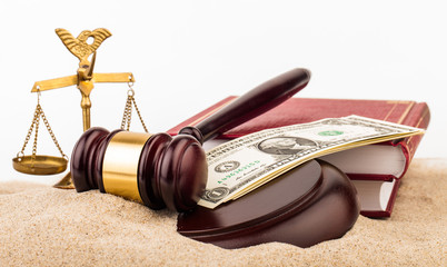 gavel, money , and scales of justice