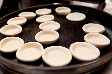 Obraz na płótnie Canvas Lotus-leaf-shaped pancake, a kind of Chinese food