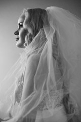 Retro portrait of a beautiful blonde bride posing