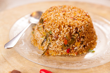 A dish of rice on the table
