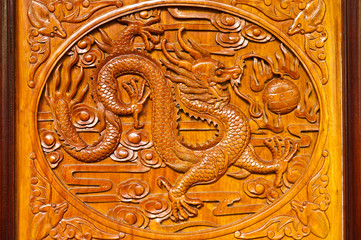 Chinese wood  door carving bats and  dragon