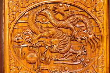 Chinese wood  door carving bats and  dragon