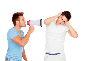 Young men screams to his friend through a megaphone