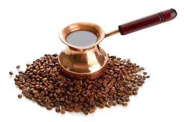 Coffee pot and coffee beans, isolated on white