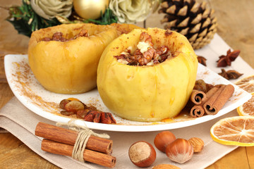 Baked apples on plate close up