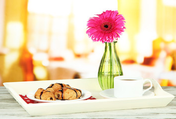 Wooden tray with breakfast, isolated on white