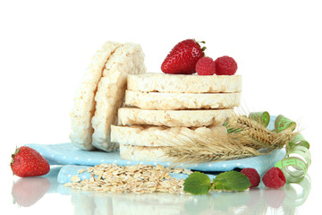 Tasty crispbread with berries, isolated on white