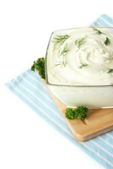Sour cream in bowl close-up