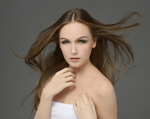 Naklejka premium Beautiful Woman with Healthy Long Hair