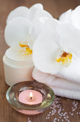 Orchids and candle