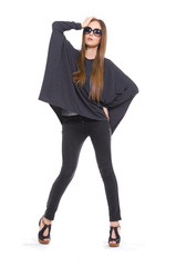 Fototapeta premium full length Slim pretty young girl in sunglasses