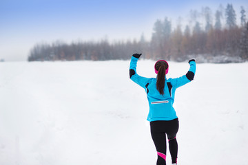 Woman running in winter