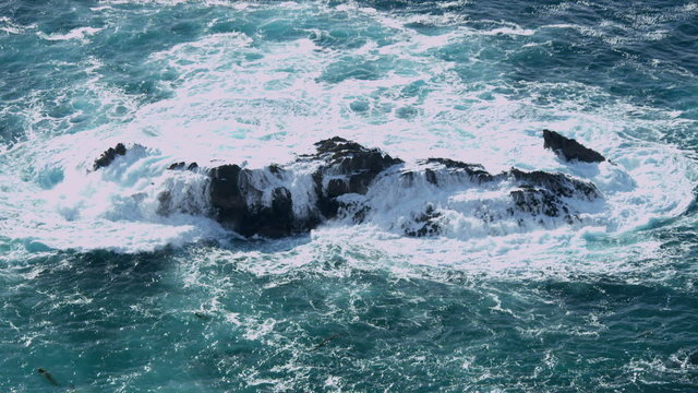 Fierce Breaking Waves Over Dangerous Rocks