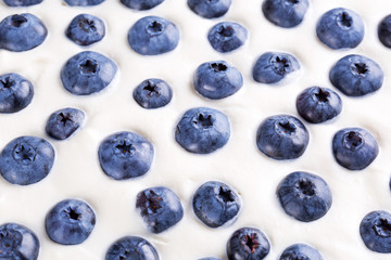 Close up of blueberry in whipped cream