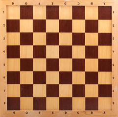 wooden chessboard isolated on white background..