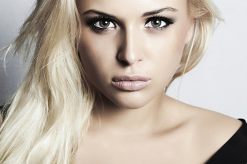 Naklejka premium beautiful blond girl with green eyes.beauty woman