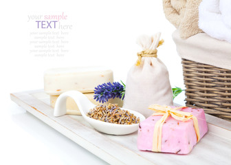 Obraz na płótnie Canvas closeup of lavender soap and scented sachets with dry lavender f