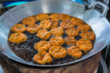 Fried fish-paste cakes on process