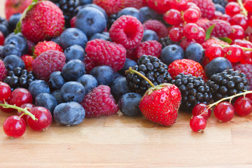 pile of fresh berries on table