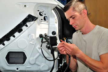 Car mechanic at work.