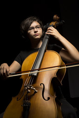 Young woman plays cello