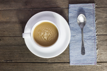 Coffee and sweets to tasty on a wooden floor