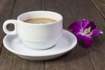 Coffee and sweets to tasty on a wooden floor