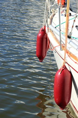 Yachting. parts of yacht maritime red fenders