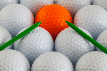 Golf balls and wooden tees