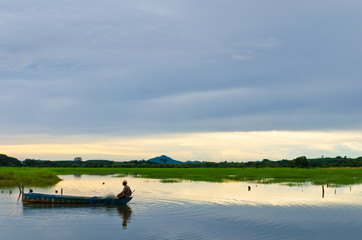 Fototapeta premium Fisherman in nature background