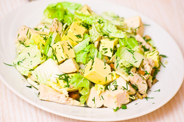 Plate with fresh caesar salad