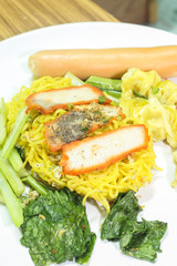 Chinese egg noodle soup with pork