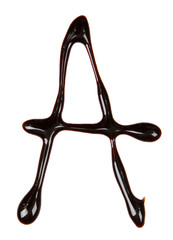 Big letter of alphabet made from chocolate syrup, isolated