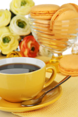 Coffee and macaroons close-up