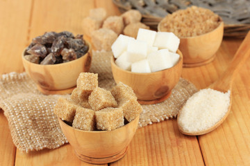Different types of sugar on table close-up