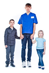 Fototapeta premium doctor in blue uniform and children