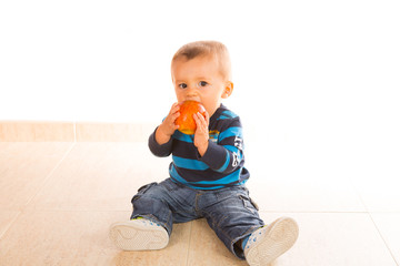 baby eating apple