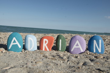 Adrian, male name on colourful stones