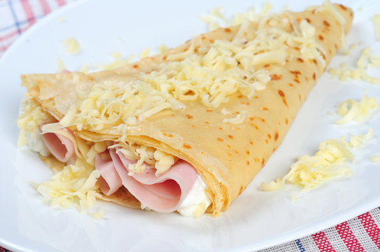 rolled crepes stuffed ham and cheese