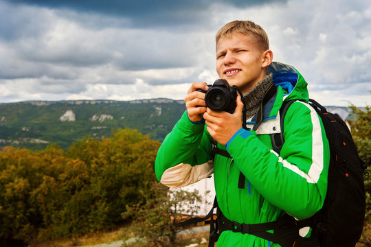 Young man outdoor photographer