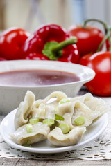 Red borsch with dumplings. Traditional polish cuisine