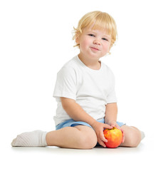 Satisfied kid eating apple